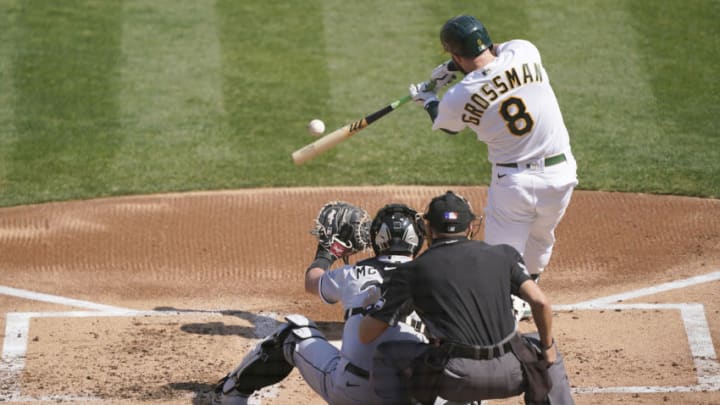 OAKLAND, CALIFORNIA - SEPTEMBER 29: Robbie Grossman #8 of the Oakland Athletics bats against the Chicago White Sox during the first inning of the Wild Card Round Game One at RingCentral Coliseum on September 29, 2020 in Oakland, California. (Photo by Thearon W. Henderson/Getty Images)