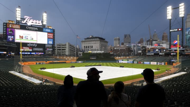 DETROIT, MICHIGAN - JULY 20: Fans wait for the delayed game between the Detroit Tigers and Texas Rangers to begin at Comerica Park on July 20, 2021 in Detroit, Michigan. (Photo by Nic Antaya/Getty Images)