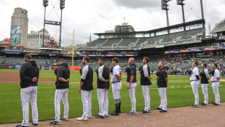 DETROIT, MICHIGAN - SEPTEMBER 15: The Detroit Tigers observe the national anthem before their game against the Milwaukee Brewers at Comerica Park on September 15, 2021 in Detroit, Michigan. (Photo by Nic Antaya/Getty Images)
