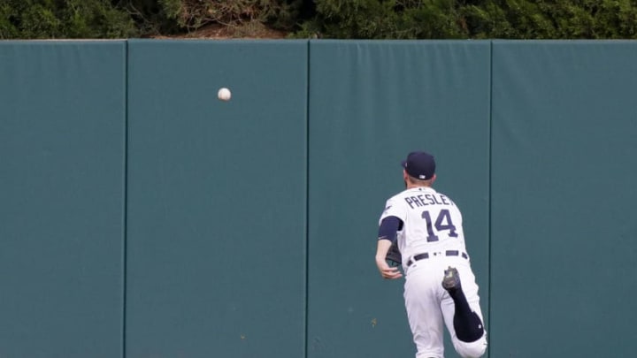 DETROIT, MI - JUNE 15: Center fielder Alex Presley #14 of the Detroit Tigers chases a RBI-double hit over his head by Logan Morrison of the Tampa Bay Rays during the third inning at Comerica Park on June 15, 2017 in Detroit, Michigan. (Photo by Duane Burleson/Getty Images)