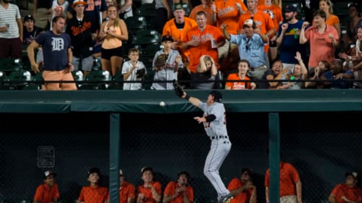 BALTIMORE, MD – AUGUST 04: Jim Adduci #37 of the Detroit Tigers is unable to catch a double hit by Seth Smith #12 of the Baltimore Orioles (not pictured) in the seventh inning during a game at Oriole Park at Camden Yards on August 4, 2017 in Baltimore, Maryland. (Photo by Patrick McDermott/Getty Images)