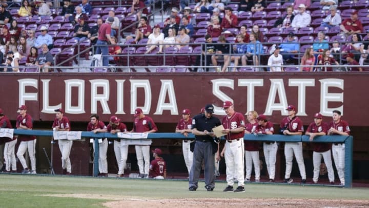 TALLAHASSEE, FL - MARCH 9: Head Coach Mike Martin of the Florida State Seminoles talk with Umpire Perry Costello about a change in the line-up during the game against Virginia Tech on Mike Martin Field at Dick Howser Stadium on March 9, 2019 in Tallahassee. FSU's CJ Van Eyk would be a great option for the Detroit Tigers in the 2020 MLB Draft. (Photo by Don Juan Moore/Getty Images) TALLAHASSEE, FL - MARCH 9: Head Coach Mike Martin of the Florida State Seminoles talk with Umpire Perry Costello about a change in the line-up during the game against Virginia Tech on Mike Martin Field at Dick Howser Stadium on March 9, 2019 in Tallahassee. FSU's CJ Van Eyk would be a great option for the Detroit Tigers in the 2020 MLB Draft. (Photo by Don Juan Moore/Getty Images)