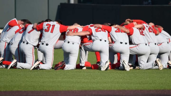 Ohio State players huddle before the start of a game.