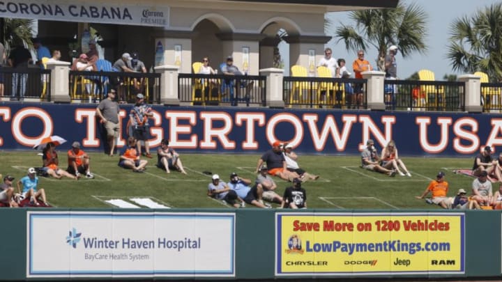 Mar 4, 2021; Lakeland, Florida, USA; Fans sit in the outfield lawn as they watch the spring training game between the Detroit Tigers and Toronto Blue Jays at Publix Field at Joker Marchant Stadium. Mandatory Credit: Kim Klement-USA TODAY Sports