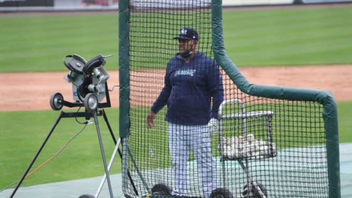 West Michigan Whitecaps manager Brayan Pena on the mound during batting practice Monday, May 3, 2021 at LMCU Ballpark in Comstock Park, MI.White Caps