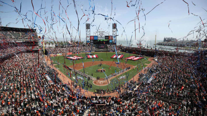 SAN FRANCISCO, CA - APRIL 03: Players for the Seattle Mariners and the San Francisco Giants line up for the National Anthem before their game at AT