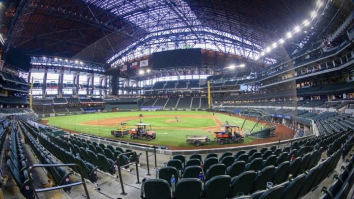 Sep 30, 2021; Arlington, Texas, USA; A view of the empty ballpark as the grounds crew tend to the field after the game between the Texas Rangers and the Los Angeles Angels Globe Life Field. Mandatory Credit: Jerome Miron-USA TODAY Sports