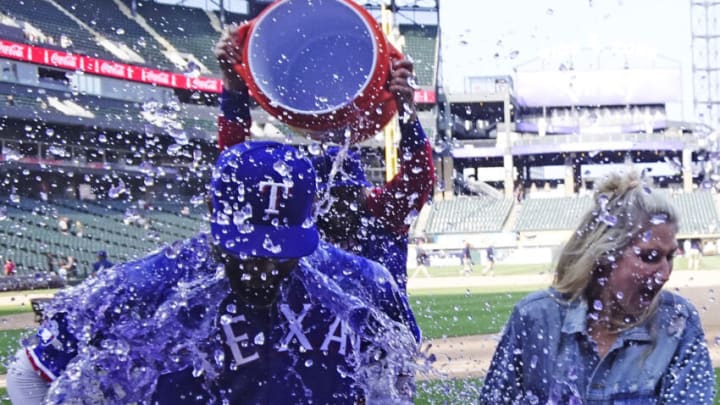 Jun 12, 2022; Chicago, Illinois, USA; Texas Rangers third baseman Ezequiel Duran (70) is doused with Gatorade after the game against the Chicago White Sox at Guaranteed Rate Field. Mandatory Credit: David Banks-USA TODAY Sports