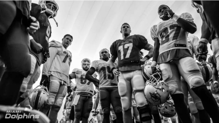 Ryan Tannehill leads the offense before a training camp practice - image courtesy of the Miami Dolphins.