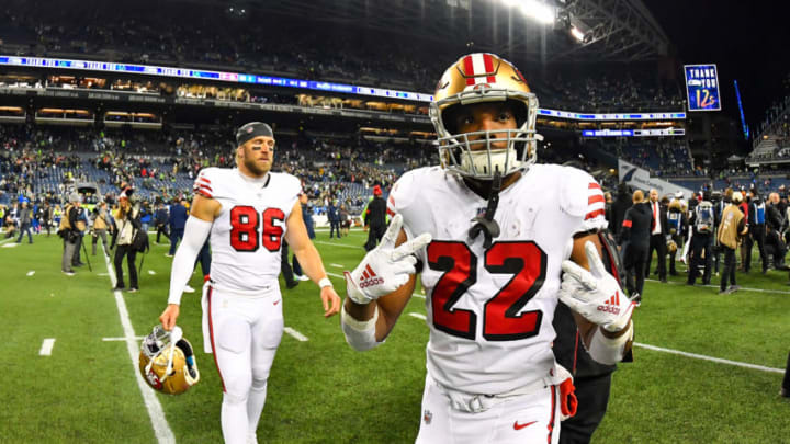 SEATTLE, WASHINGTON - DECEMBER 29: Matt Breida #22, left, and Kyle Nelson #86 of the San Francisco 49ers make their way to the locker room after the game against the Seattle Seahawks at CenturyLink Field on December 29, 2019 in Seattle, Washington. The San Francisco 49ers top the Seattle Seahawks 26-21. (Photo by Alika Jenner/Getty Images)