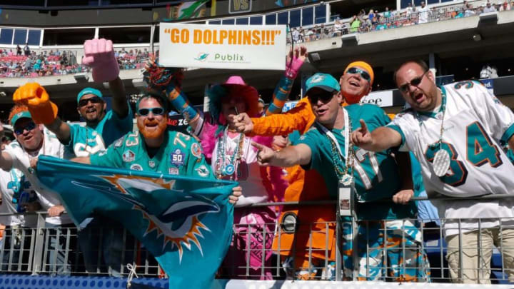 NASHVILLE, TN - OCTOBER 18: Fans of the Miami Dolphins cheer during the second half of a game against the Tennessee Titans at Nissan Stadium on October 18, 2015 in Nashville, Tennessee. (Photo by Frederick Breedon/Getty Images)