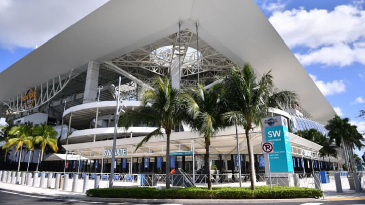 MIAMI GARDENS, FLORIDA - NOVEMBER 15: Covid-19 informational signage displayed on the entrance gates prior to the game between the Miami Dolphins and the Los Angeles Chargers at Hard Rock Stadium on November 15, 2020 in Miami Gardens, Florida. (Photo by Mark Brown/Getty Images)