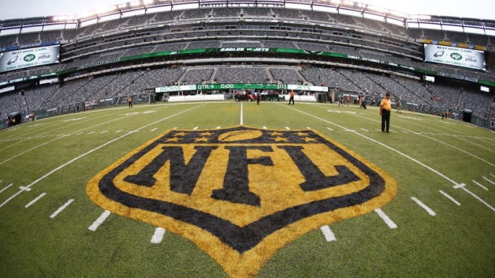 EAST RUTHERFORD, NJ - SEPTEMBER 13: The NFL shield is painted in gold and black after a game between the Cleveland Browns and the New York Jets at MetLife Stadium on September 13, 2015 in East Rutherford, New Jersey. The new color scheme is to commemorate this years' Super Bowl witch will be the 50th edition. (Photo by Rich Schultz /Getty Images)