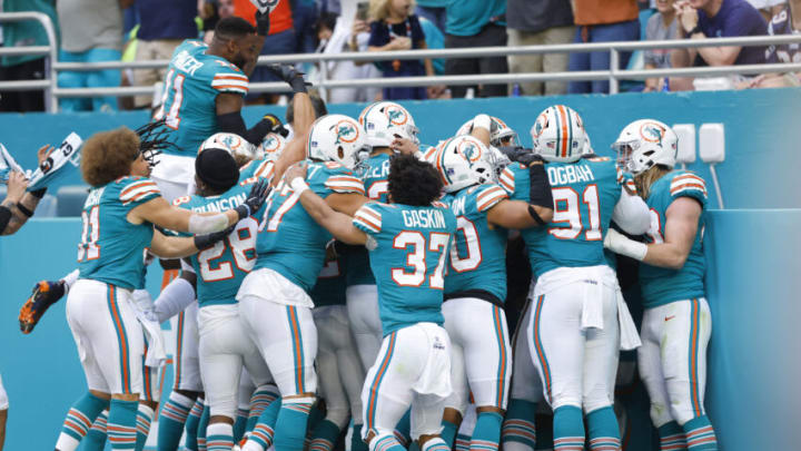 MIAMI GARDENS, FLORIDA - JANUARY 09: Xavien Howard #25 of the Miami Dolphins celebrates an interception return for a touchdown against the New England Patriots during the first quarter at Hard Rock Stadium on January 09, 2022 in Miami Gardens, Florida. (Photo by Michael Reaves/Getty Images)