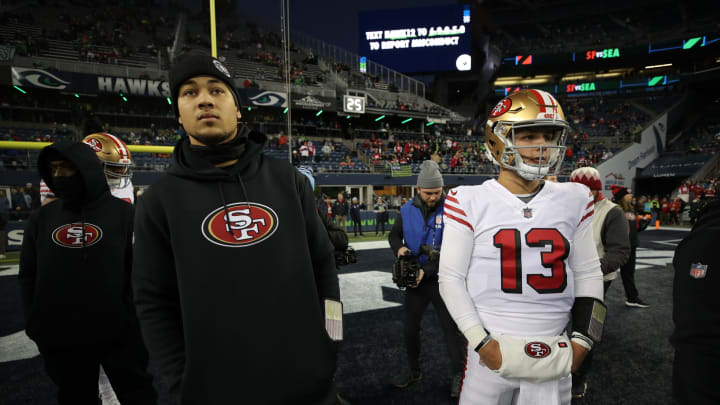 SEATTLE, WA – DECEMBER 15: Trey Lance #5 and Brock Purdy #13 of the San Francisco 49ers on the field before the game against the Seattle Seahawks at Lumen Field on December 15, 2022, in Seattle, Washington. The 49ers defeated the Seahawks 21-13. (Photo by Michael Zagaris/San Francisco 49ers/Getty Images)
