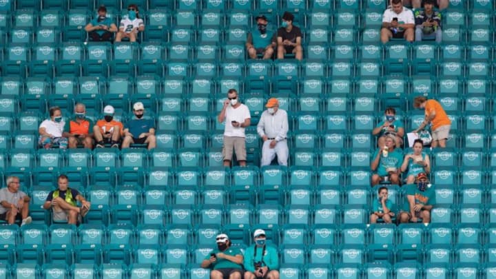 Fans social distance at Hard Rock Stadium in Miami Gardens, October 4, 2020. [ALLEN EYESTONE/The Palm Beach Post]