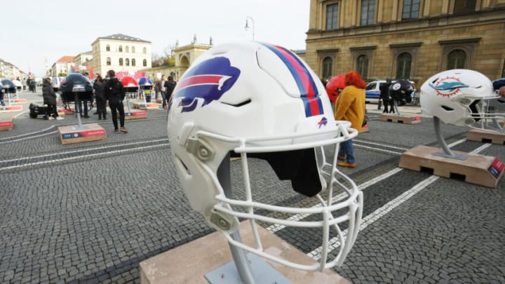 Nov 11, 2022; Munich, Germany; Large helmets of the Buffalo Bills and Miami Dolphins at fan activation event at Odeonsplatz. Mandatory Credit: Kirby Lee-USA TODAY Sports