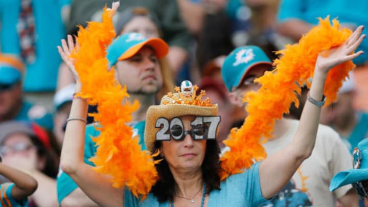 Jan 1, 2017; Miami Gardens, FL, USA; Miami Dolphins fans cheer during an NFL football game between the Miami Dolphins and the New England Patriots at Hard Rock Stadium. Mandatory Credit: Reinhold Matay-USA TODAY Sports