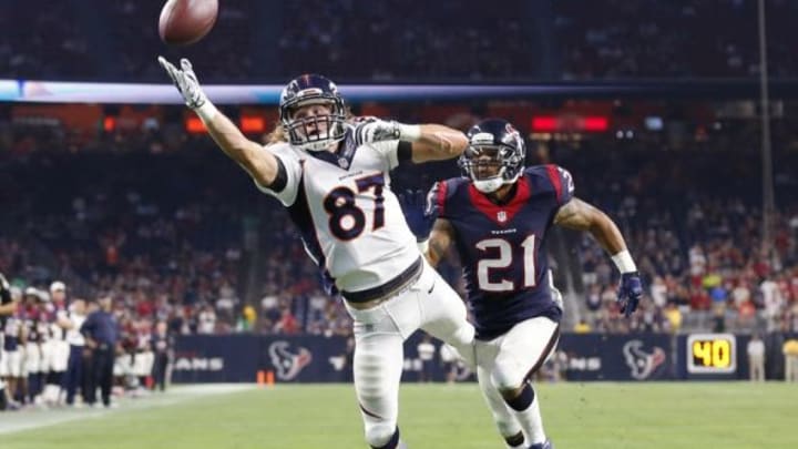 Aug 22, 2015; Houston, TX, USA; Denver Broncos receiver Jordan Taylor (87) can not make the catch in the end zone in the fourth quarter against Houston Texans cornerback Darryl Morris (21) at NRG Stadium. The Broncos beat the Texans 14-10. Mandatory Credit: Matthew Emmons-USA TODAY Sports