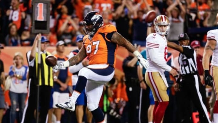 Aug 20, 2016; Denver, CO, USA; Denver Broncos defensive tackle Billy Winn (97) celebrates after recovering a fumble in the second quarter against the San Francisco 49ers at Sports Authority Field at Mile High. Mandatory Credit: Isaiah J. Downing-USA TODAY Sports