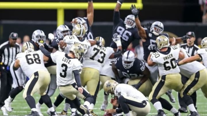Sep 11, 2016; New Orleans, LA, USA; New Orleans Saints kicker Will Lutz (3) attempts a 61-yard field goal from the hold of Thomas Morstead (6) on the last play of the game against the Oakland Raiders in the second half at the Mercedes-Benz Superdome. The Raiders won 35-34. Mandatory Credit: Chuck Cook-USA TODAY Sports