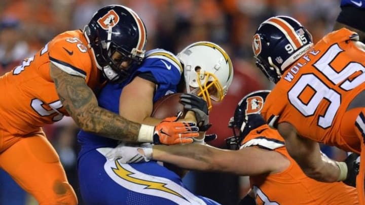 Oct 13, 2016; San Diego, CA, USA; San Diego Chargers quarterback Philip Rivers (17) is sacked by Denver Broncos outside linebacker Shane Ray (bottom) outside linebacker Von Miller (58) and defensive end Derek Wolfe (95) during the fourth quarter at Qualcomm Stadium. Mandatory Credit: Jake Roth-USA TODAY Sports