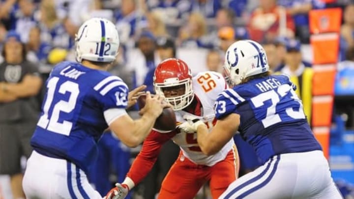 Oct 30, 2016; Indianapolis, IN, USA; Kansas City Chiefs linebacker Dadi Nicolas (52) tries to elude Indianapolis Colts tackle Joe Haeg (73) as Colts quarterback Andrew Luck (12) looks for an open receiver at Lucas Oil Stadium. Mandatory Credit: Thomas J. Russo-USA TODAY Sports