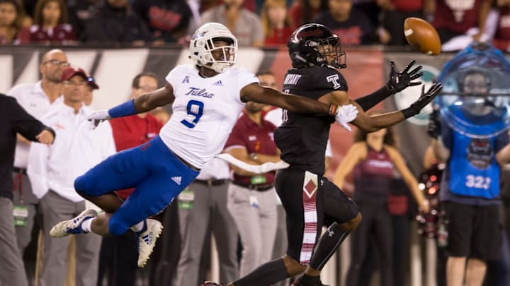 PHILADELPHIA, PA – SEPTEMBER 20: Ventell Bryant #1 of the Temple Owls cannot make the catch against Reggie Robinson II #9 of the Tulsa Golden Hurricane at Lincoln Financial Field on September 20, 2018 in Philadelphia, Pennsylvania. (Photo by Mitchell Leff/Getty Images)