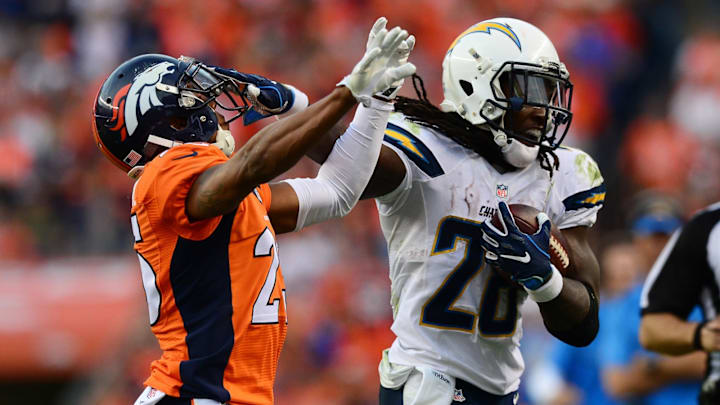 DENVER, CO – OCTOBER 30: Running back Melvin Gordon #28 of the San Diego Chargers fights off cornerback Chris Harris #25 of the Denver Broncos in the fourth quarter of the game at Sports Authority Field at Mile High on October 30, 2016, in Denver, Colorado. (Photo by Dustin Bradford/Getty Images)