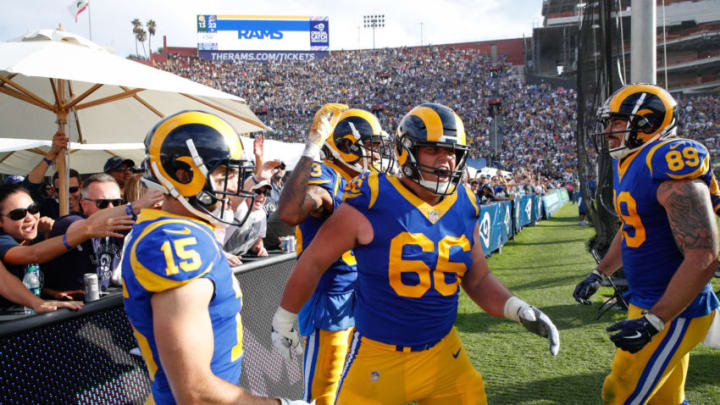 LOS ANGELES, CA - OCTOBER 28: Offensive guard Austin Blythe #66 reacts with teammates Nick Williams #15 and Tyler Higbee #89 of the Los Angeles Rams in front of the crowd at Los Angeles Memorial Coliseum on October 28, 2018 in Los Angeles, California. (Photo by Joe Robbins/Getty Images)
