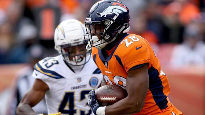 DENVER, COLORADO – DECEMBER 30: Royce Freeman #28 of the Denver Broncos carries the ball against the Los Angeles Chargers at Broncos Stadium at Mile High on December 30, 2018 in Denver, Colorado. (Photo by Matthew Stockman/Getty Images)