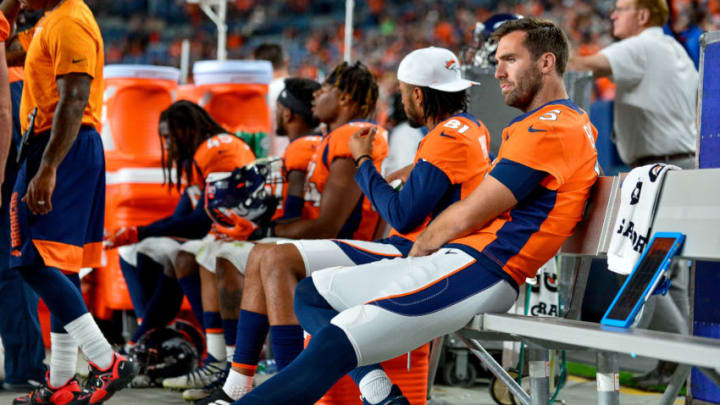 DENVER, CO - AUGUST 29: Joe Flacco #5 of the Denver Broncos sits on the bench during a preseason National Football League game against the Arizona Cardinals at Broncos Stadium at Mile High on August 29, 2019 in Denver, Colorado. (Photo by Dustin Bradford/Getty Images)