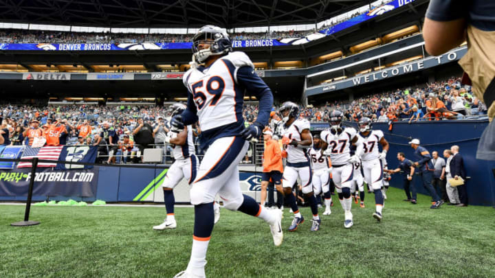 SEATTLE, WASHINGTON - AUGUST 08: Malik Reed #59 of the Denver Broncos runs onto the field before the preseason game against the Seattle Seahawks at CenturyLink Field on August 08, 2019 in Seattle, Washington. (Photo by Alika Jenner/Getty Images)