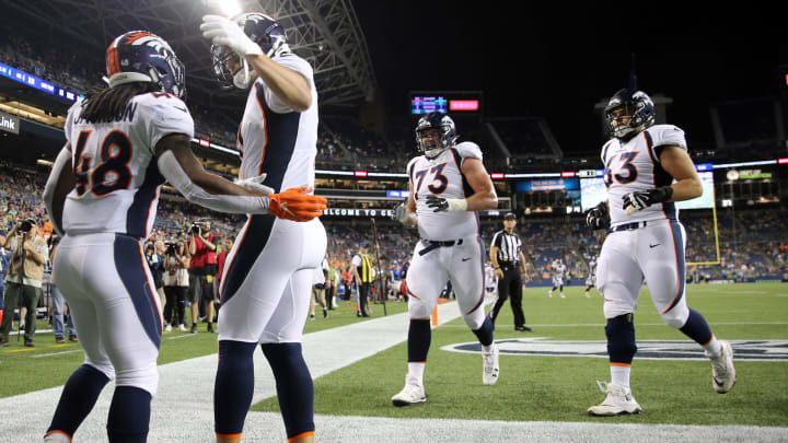 SEATTLE, WASHINGTON – AUGUST 08: Devontae Jackson #48 of the Denver Broncos celebrates with teammates after making a four yard touchdown against the Seattle Seahawks in the fourth quarter during their preseason game at CenturyLink Field on August 08, 2019 in Seattle, Washington. (Photo by Abbie Parr/Getty Images)