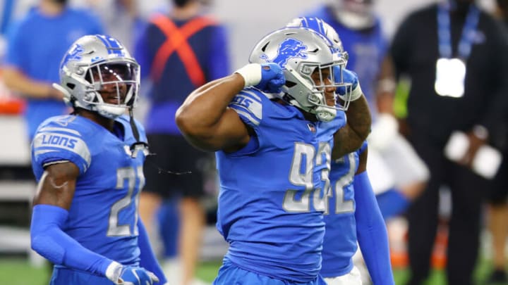 Denver Broncos: Da'Shawn Hand #93 of the Detroit Lions celebrates after a tackle against the Indianapolis Colts during the first quarter at Ford Field on November 01, 2020 in Detroit, Michigan. (Photo by Rey Del Rio/Getty Images)