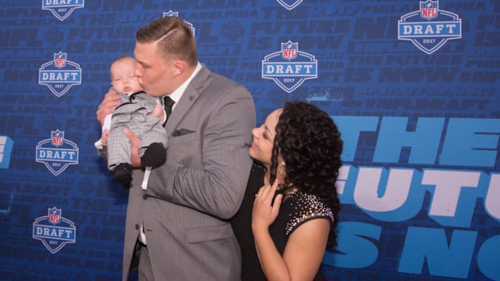 PHILADELPHIA, PA - APRIL 27: Garett Bolles of Utah pose for a picture with his wife Natalie Bolles and child on the red carpet prior to the start of the 2017 NFL Draft on April 27, 2017 in Philadelphia, Pennsylvania. (Photo by Mitchell Leff/Getty Images)