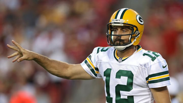 LANDOVER, MD - AUGUST 19: Quarterback Aaron Rodgers #12 of the Green Bay Packers signals a play against the Washington Redskins in the first half during a preseason game at FedExField on August 19, 2017 in Landover, Maryland. (Photo by Patrick Smith/Getty Images)