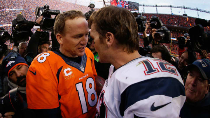 DENVER, CO - JANUARY 24: Quarterbacks Peyton Manning #18 of the Denver Broncos and Tom Brady #12 of the New England Patriots shake hands following the AFC Championship game at Sports Authority Field at Mile High on January 24, 2016 in Denver, Colorado. The Broncos defeated the Patriots 20-18. (Photo by Christian Petersen/Getty Images)