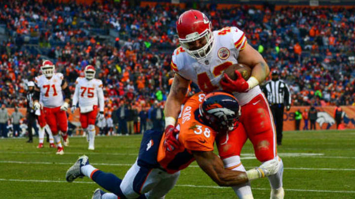 DENVER, CO – DECEMBER 31: Fullback Anthony Sherman #42 of the Kansas City Chiefs is hit by cornerback Marcus Rios #38 of the Denver Broncos at Sports Authority Field at Mile High on December 31, 2017 in Denver, Colorado. (Photo by Dustin Bradford/Getty Images)