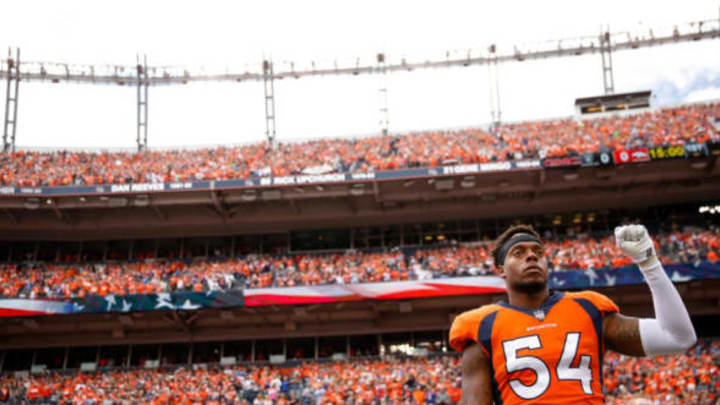 DENVER, CO – OCTOBER 1: Inside linebacker Brandon Marshall #54 of the Denver Broncos stands and holds a fist in the air during the national anthem before a game against the Oakland Raiders at Sports Authority Field at Mile High on October 1, 2017 in Denver, Colorado. (Photo by Justin Edmonds/Getty Images)