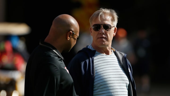 STANFORD, CA – FEBRUARY 04: Denver Broncos general manager and executive vice president of football operations John Elway (R) talks to Stanford football head coach David Shaw during the Broncos practice at Stanford Stadium on February 4, 2016 in Stanford, California. The Broncos will play the Carolina Panthers in Super Bowl 50 on February 7, 2016. (Photo by Ezra Shaw/Getty Images)
