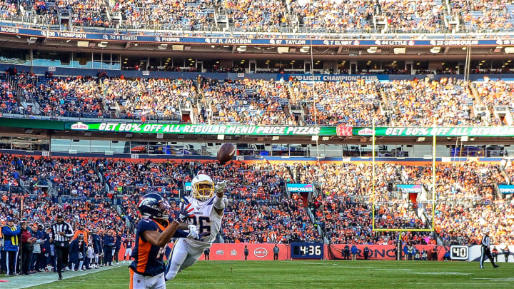 DENVER, CO – DECEMBER 1: Courtland Sutton #14 of the Denver Broncos catches a first-quarter touchdown reception under coverage by Casey Hayward Jr. #26 of the Los Angeles Chargers during a game at Empower Field at Mile High on December 1, 2019 in Denver, Colorado. (Photo by Dustin Bradford/Getty Images)