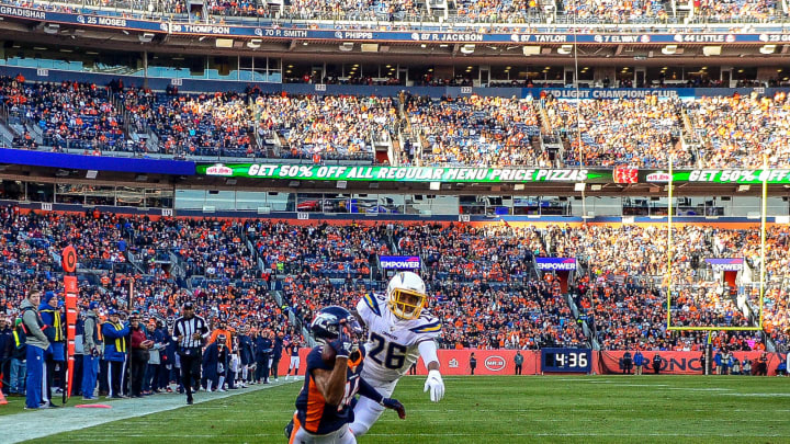 DENVER, CO – DECEMBER 1: Courtland Sutton #14 of the Denver Broncos catches a first quarter touchdown reception under coverage by Casey Hayward Jr. #26 of the Los Angeles Chargers during a game at Empower Field at Mile High on December 1, 2019 in Denver, Colorado. (Photo by Dustin Bradford/Getty Images)