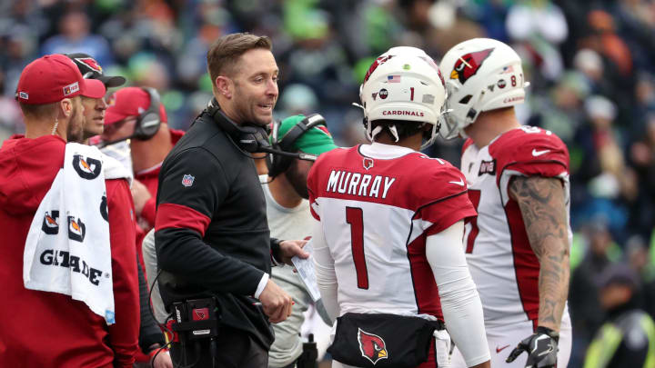 SEATTLE, WASHINGTON – DECEMBER 22: Head Coach Kliff Kingsbury of the Arizona Cardinals and Kyler Murray #1 of the Arizona Cardinals have a conversation in the first half against the Seattle Seahawks during their game at CenturyLink Field on December 22, 2019, in Seattle, Washington. (Photo by Abbie Parr/Getty Images)
