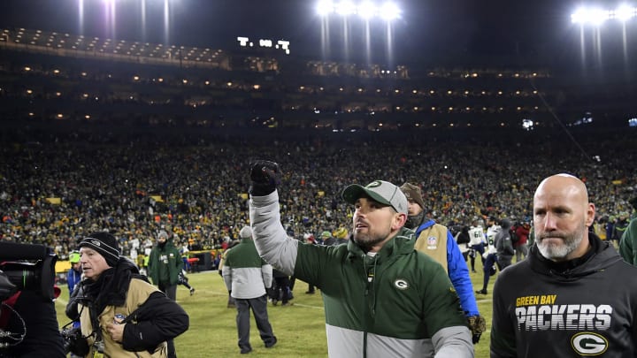 GREEN BAY, WISCONSIN – JANUARY 12: Head coach Matt LaFleur of the Green Bay Packers celebrates as he walks off the field after their 28-23 win over the Seattle Seahawks in the NFC Divisional Playoff game at Lambeau Field on January 12, 2020 in Green Bay, Wisconsin. (Photo by Quinn Harris/Getty Images)