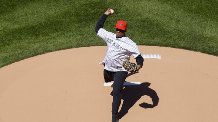 DENVER, CO – APRIL 8: Quarterback Russell Wilson of the Denver Broncos throws out the first pitch before a game between the Colorado Rockies and the Los Angeles Dodgers on Opening Day at Coors Field on April 8, 2022 in Denver, Colorado. (Photo by Justin Edmonds/Getty Images)