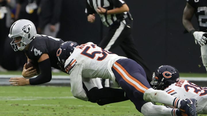LAS VEGAS, NEVADA – OCTOBER 10: Quarterback Derek Carr #4 of the Las Vegas Raiders is sacked by outside linebacker Khalil Mack #52 of the Chicago Bears during their game at Allegiant Stadium on October 10, 2021 in Las Vegas, Nevada. The Bears defeated the Raiders 20-9. (Photo by Ethan Miller/Getty Images)