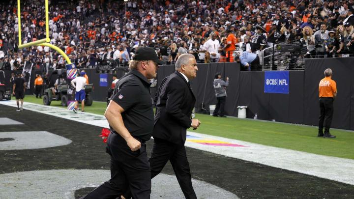 LAS VEGAS, NEVADA – OCTOBER 10: Head coach Jon Gruden (L) of the Las Vegas Raiders and Raiders director of team security Bob Stiriti run off the field after the team’s 20-9 loss to the Chicago Bears at Allegiant Stadium on October 10, 2021 in Las Vegas, Nevada. (Photo by Ethan Miller/Getty Images)
