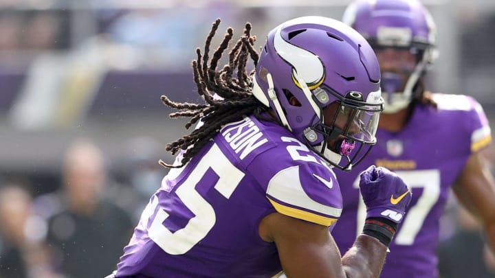 MINNEAPOLIS, MINNESOTA – OCTOBER 10: Alexander Mattison #25 of the Minnesota Vikings scores a touchdown in the second half against the Detroit Lions at U.S. Bank Stadium on October 10, 2021 in Minneapolis, Minnesota. The Minnesota Vikings defeated the Detroit Lions 19-17. (Photo by Elsa/Getty Images)