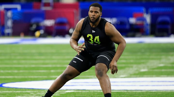 INDIANAPOLIS, INDIANA – MARCH 04: Thayer Munford Jr #OL34 of the Ohio State Buckeyes runs a drill during the NFL Combine at Lucas Oil Stadium on March 04, 2022 in Indianapolis, Indiana. (Photo by Justin Casterline/Getty Images)